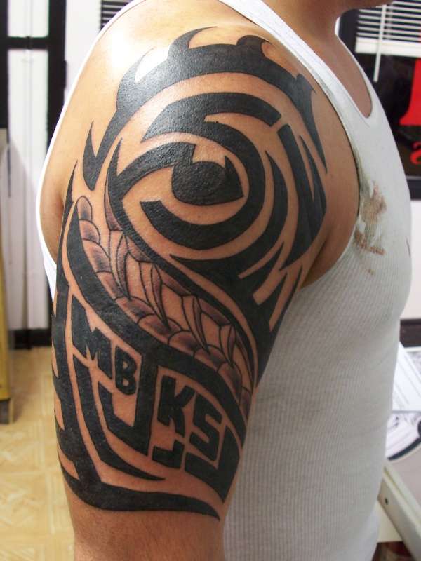 14 Interesting Family Tribal Tattoos