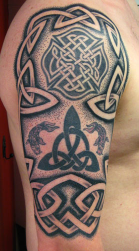 Irish Street Tattoo The Rock type arm/chest only shaded. | IRISH ST TATTOO